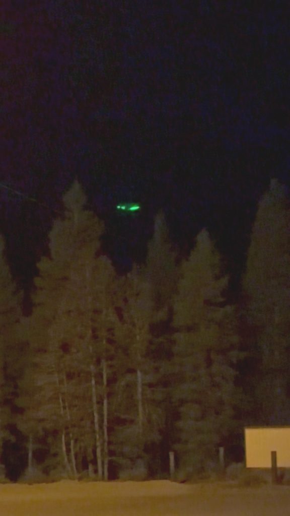 Three green light UAP hovers over leadville, Colorado.